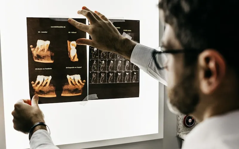 Dental hygienist performing a scaling procedure with professional instruments
