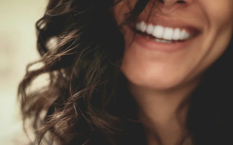 Healthy pink gums and clean teeth after a successful deep cleaning treatment