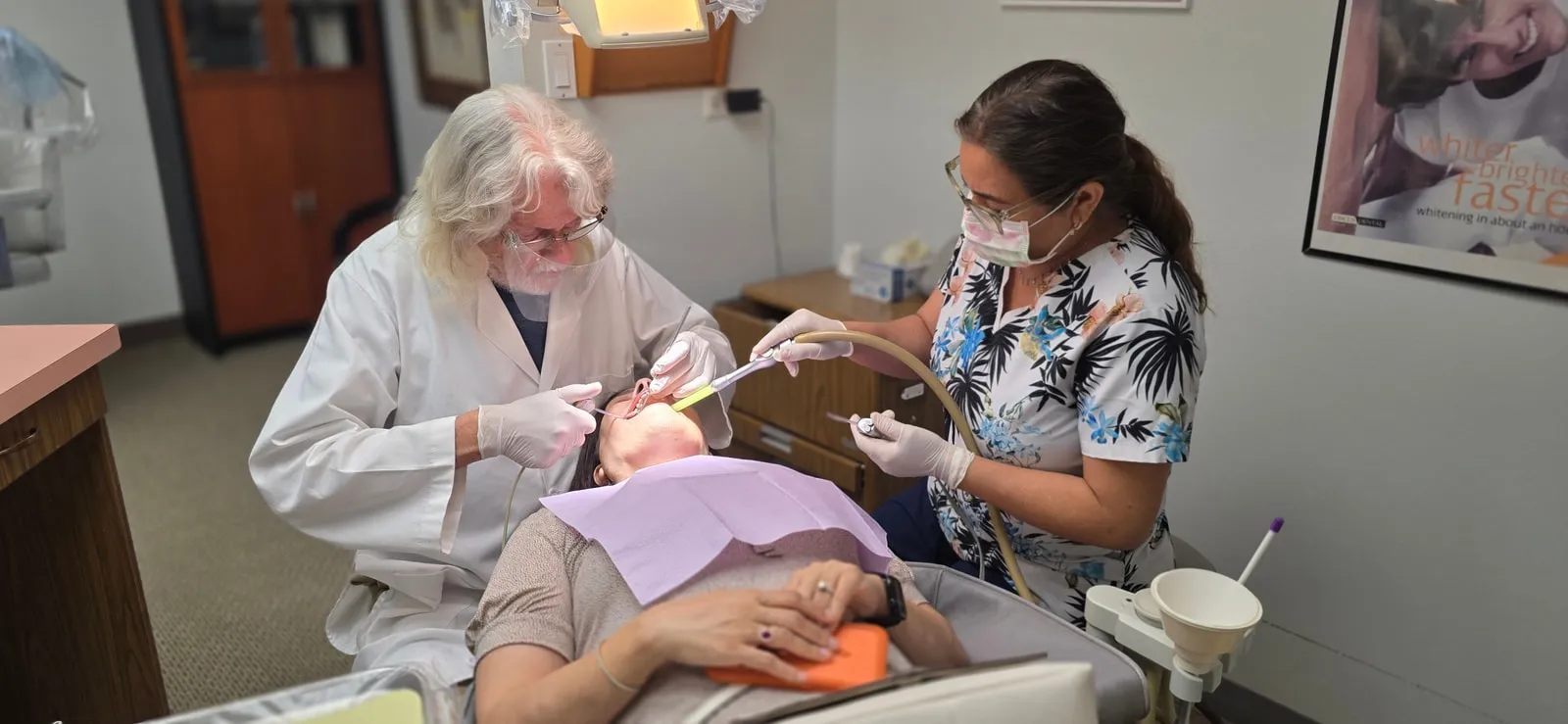 HB Dentist team providing attentive patient care in Huntington Beach