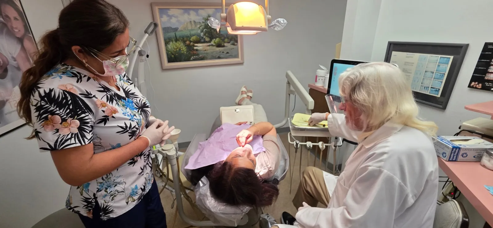 Huntington Beach dentist reviewing a digital treatment plan with a patient