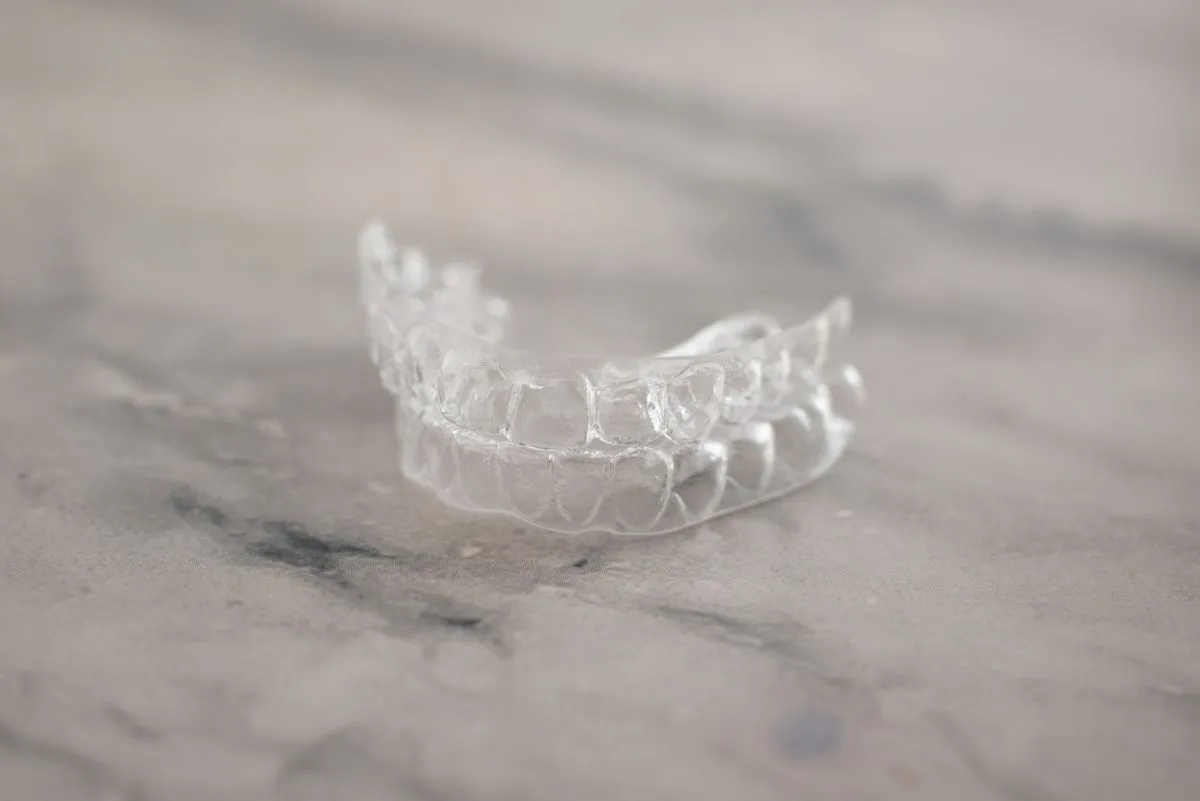 Clear Invisalign aligners for cosmetic smile alignment